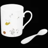 Christofle Porcelain Baby cup and Silver plated spoon set